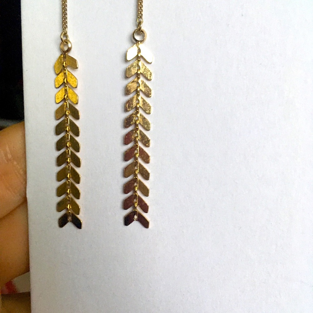 Gold feathered drop earrings